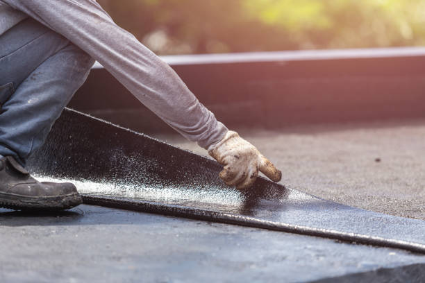 Professional Waterproofing technician working in Utica, IN